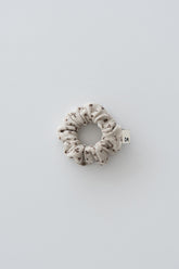 Maple oat scrunchie with tiny brown floral print – Avauma